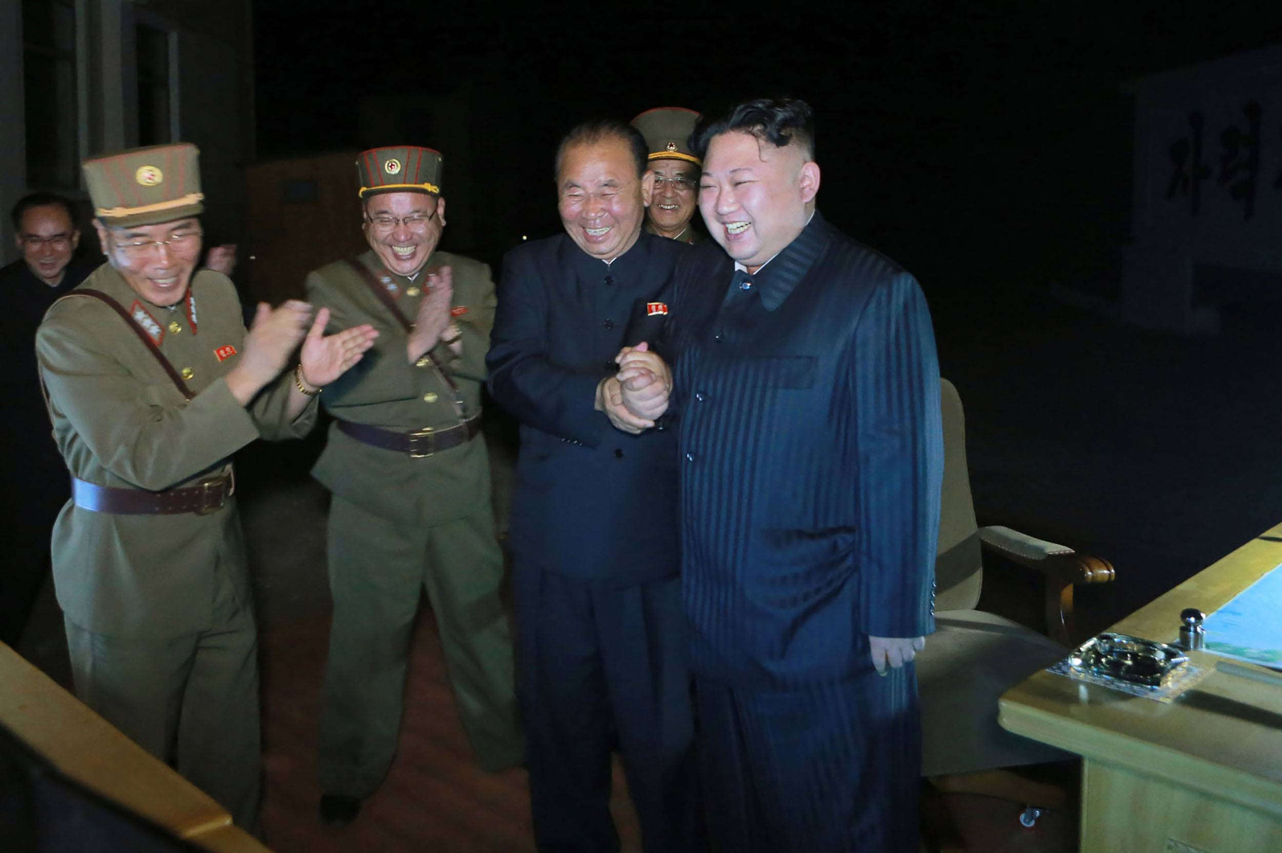 PHOTO: A picture released from the Korean Central News Agency (KCNA) on July 29, 2017 shows North Korean leader Kim Jong-Un, celebrating a test launch of an intercontinental ballistic missile (ICBM), Hwasong-14 at undisclosed place in North Korea.