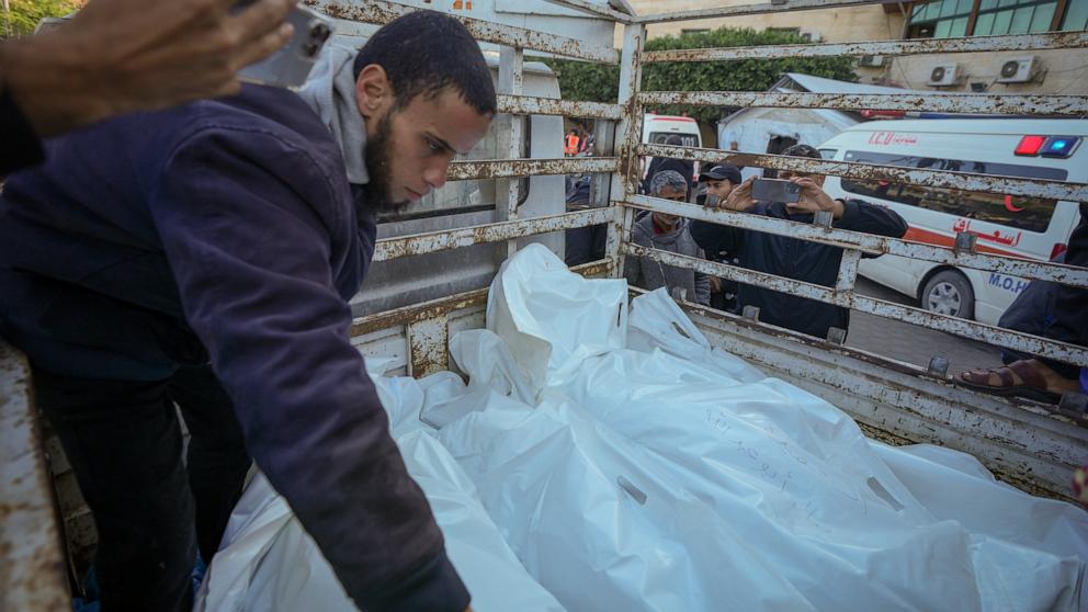 PHOTO: Bodies of victims of an Israeli airstrike on the Nuseirat camp arrive at the Al-Aqsa Martyrs hospital in Deir al-Balah, Gaza Strip, on Dec. 21, 2024.