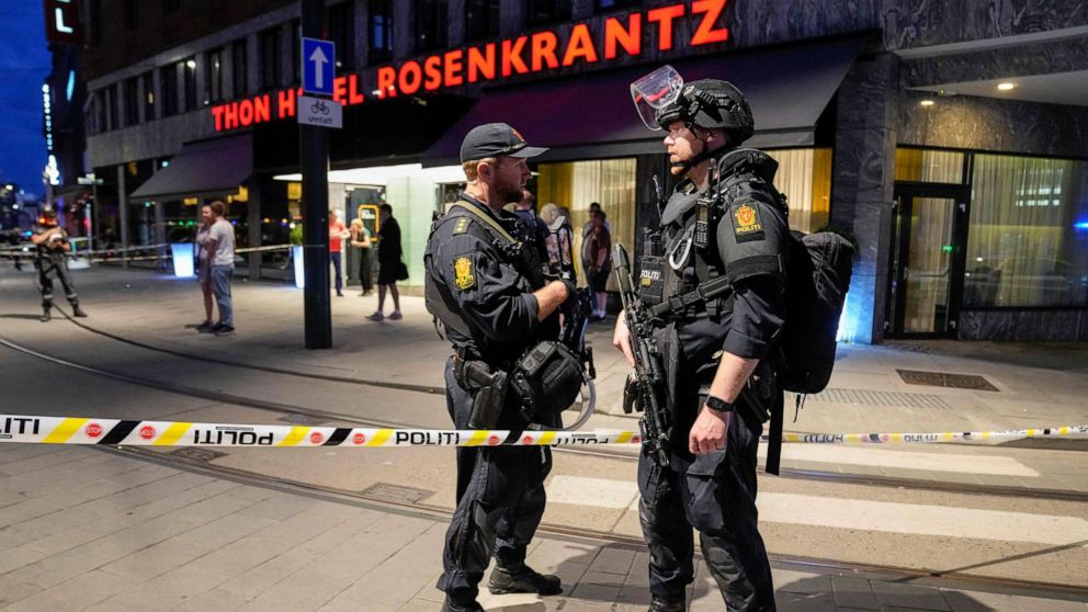 PHOTO: Police secure the area after a shooting in Oslo on June 25, 2022. - Two people were killed and several others seriously wounded in a shooting in central Oslo, Norwegian police said on June 25. 