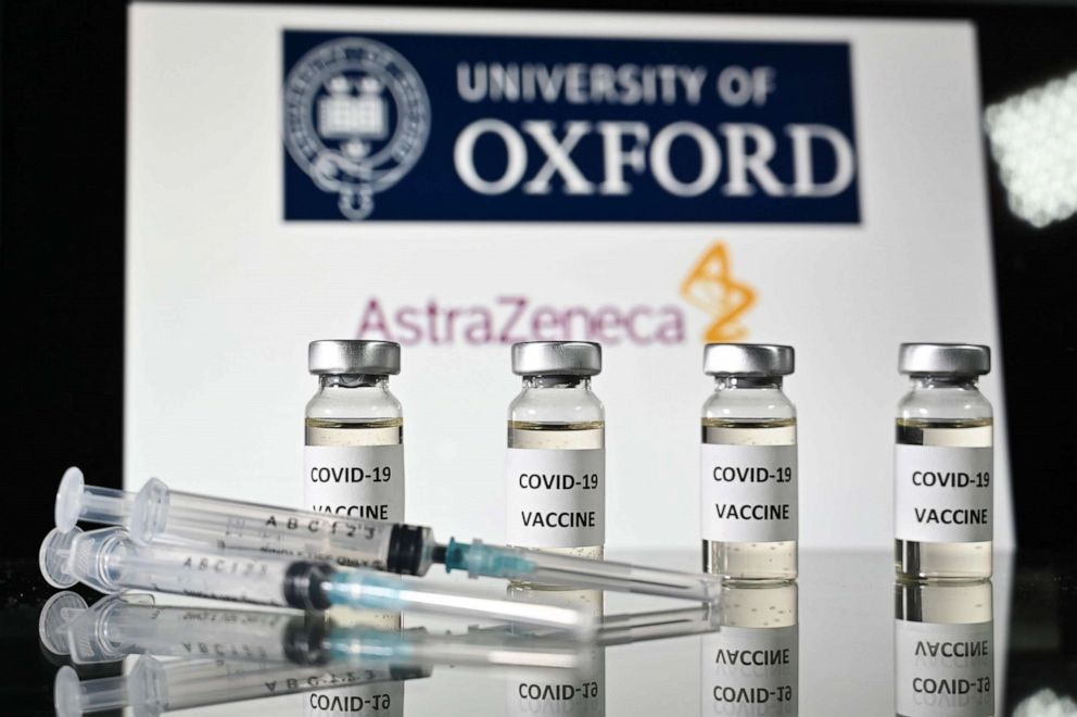 PHOTO: An illustration picture shows vials with Covid-19 Vaccine stickers attached and syringes, with the logo of the University of Oxford and its partner British pharmaceutical company AstraZeneca, on November 17, 2020. 