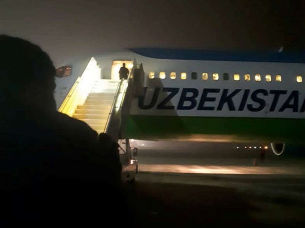 PHOTO: U.S.-trained Afghan pilots and other personnel who escaped to Tajikistan at the end of the war with the Taliban board a U.S.-brokered flight out of the country, Nov. 9, 2021, ending a nearly three-month detention. 