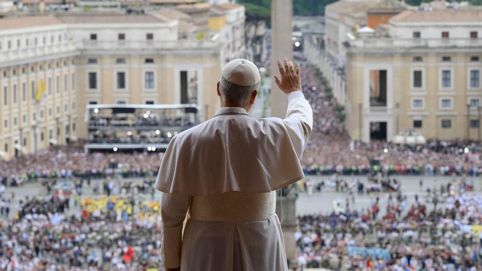 PHOTO: Pope Leo XIV waves during his first Reginal Caeli prayer from the main central loggia of St. Peter's Basilica in the Vatican, May 11, 2025.