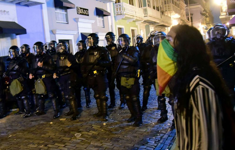 PHOTO: Police units protect the area near the executive mansion from protesters demanding the resignation of Gov. Ricardo Rossello, in San Juan, Puerto Rico, July 15, 2019.