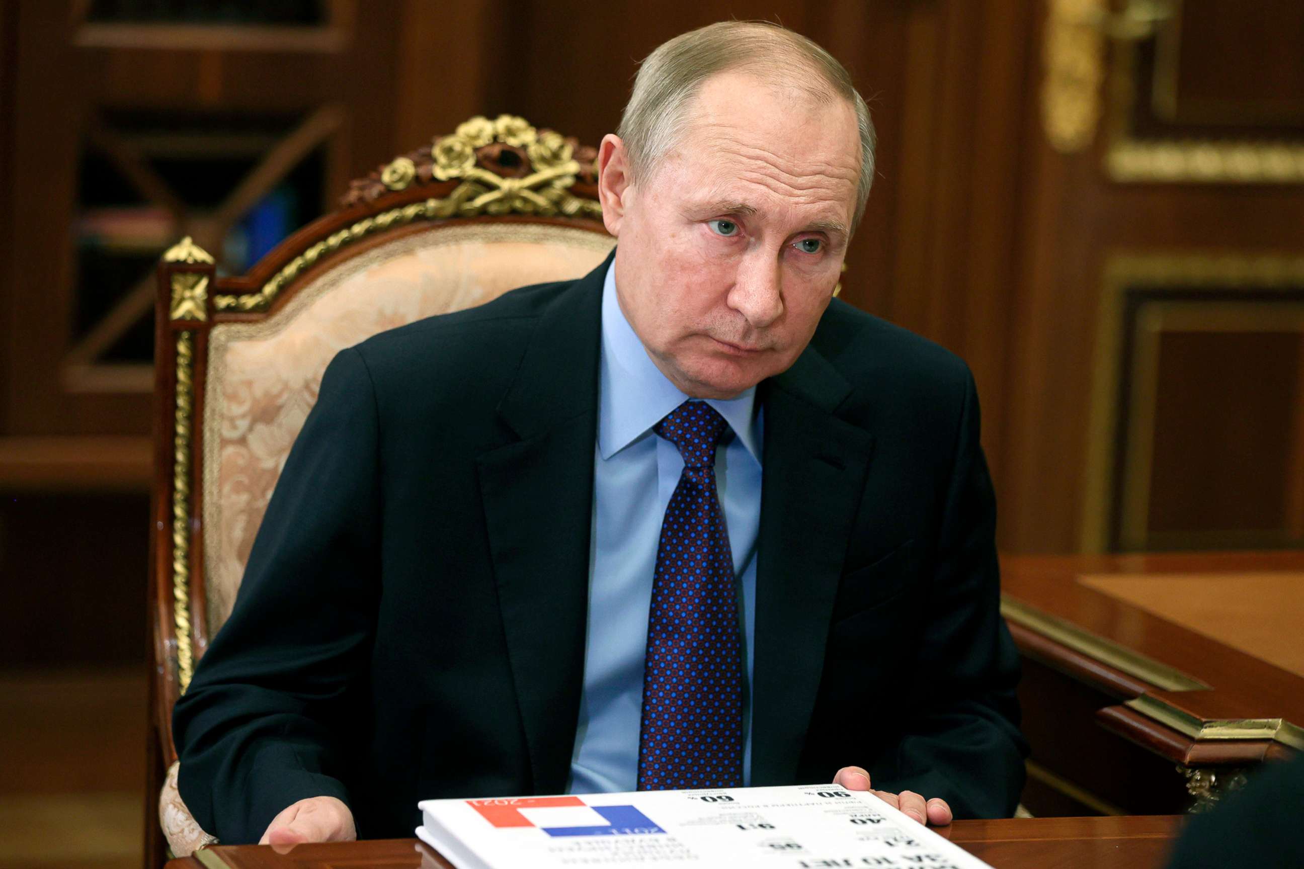PHOTO: Russian President Vladimir Putin listens during a meeting in Moscow, Dec. 30, 2021. 