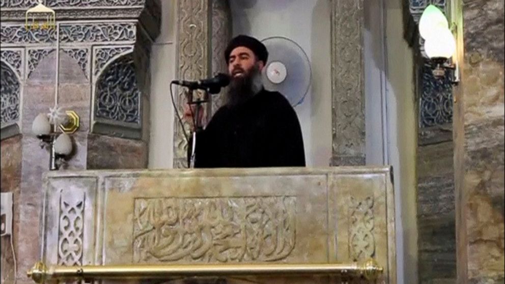 PHOTO: A man purported to be the reclusive leader of the militant Islamic State Abu Bakr al-Baghdadi marks what would have been his first public appearance, at a mosque in the centre of Mosul, according to a video recording posted on July 5, 2014.