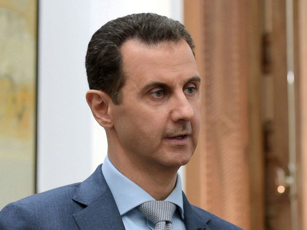 PHOTO: Syria's President Bashar al-Assad speaks during an interview with Yahoo News in this handout picture provided by SANA, on Feb. 10, 2017, Syria. 