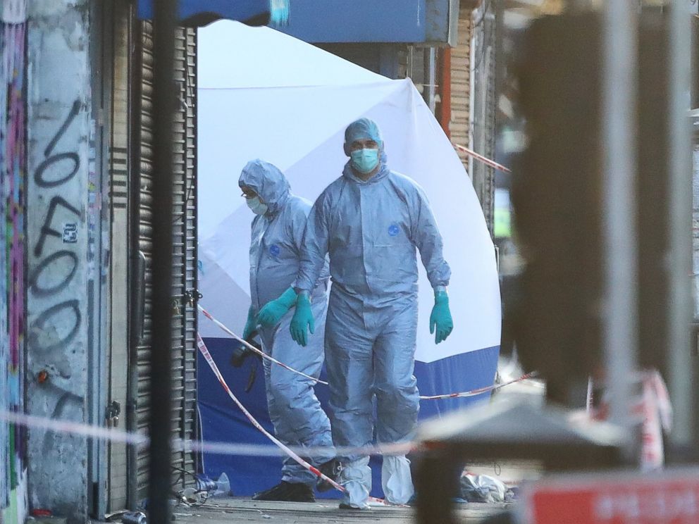 PHOTO: Forensic and police officers attend to the scene after a vehicle collided with pedestrians in the Finsbury Park neighborhood of North London, June 19, 2017.