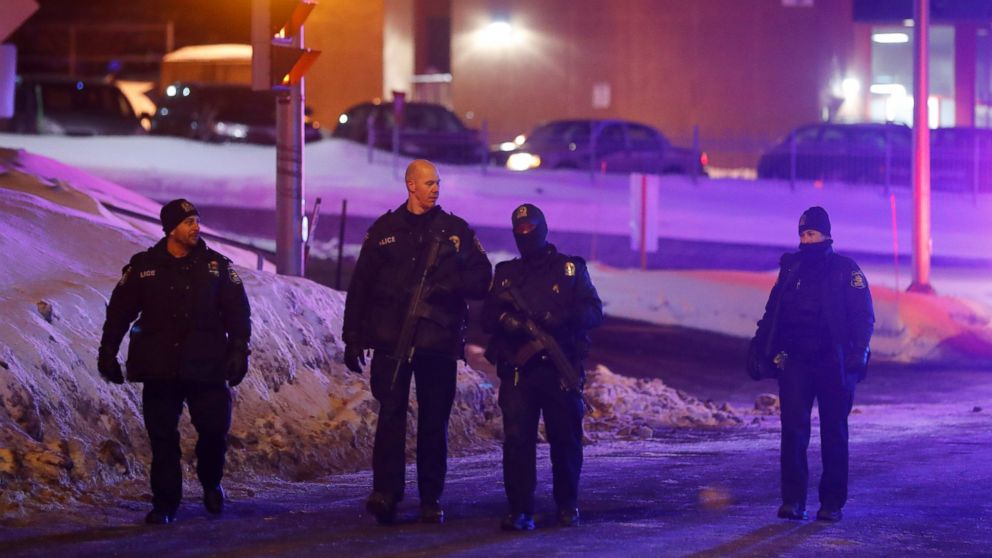 PHOTO: Police officers patrol the perimeter near a mosque after a shooting in Quebec City, Jan. 29, 2017.