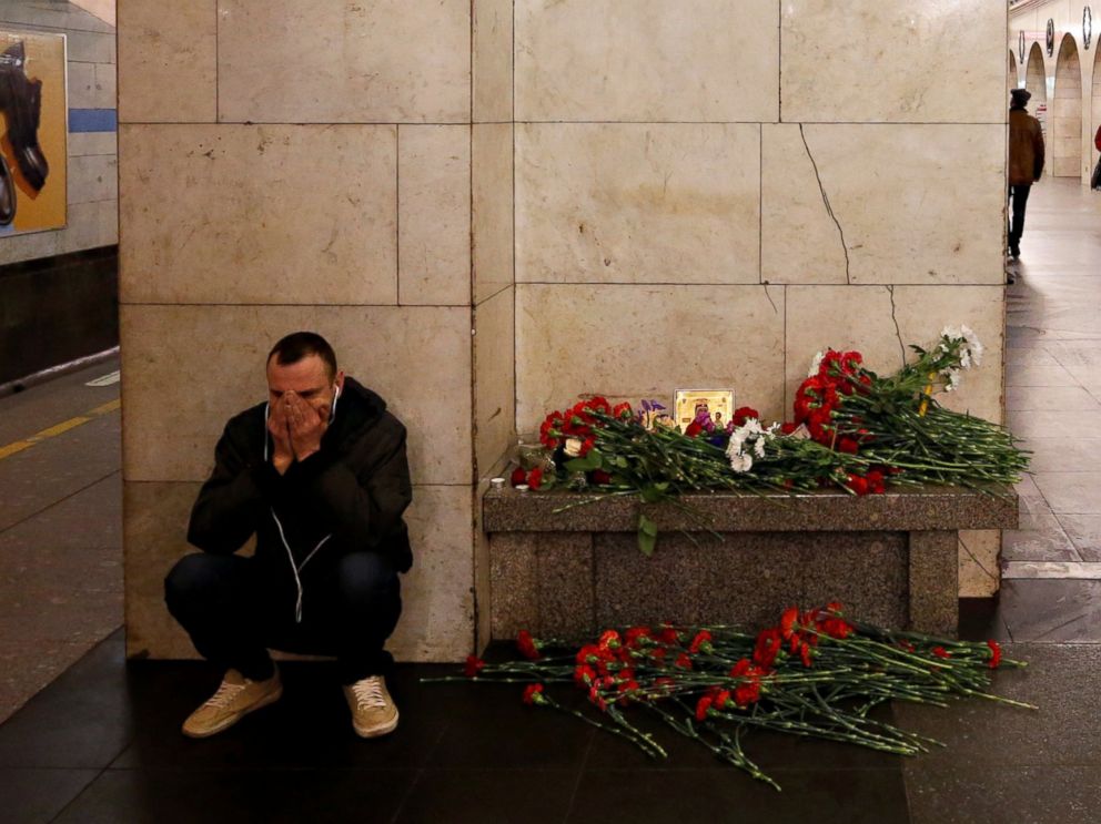 PHOTO: A day after a deadly blast in the St. Petersburg metro, a man reacts next to a memorial site for the victims at Tekhnologicheskiy institut metro station, Apr. 4, 2017, in St. Petersburg, Russia.