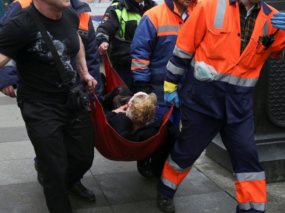 PHOTO: An injured person is helped by emergency services outside Sennaya Ploshchad metro station, following explosions in two train carriages at metro stations in St. Petersburg, Russia, April 3, 2017.
