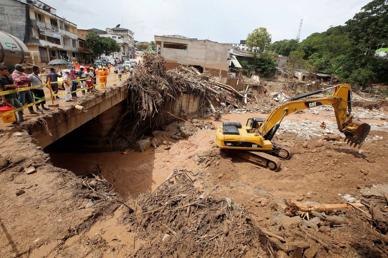 Colombia looks for victims and survivors after flash floods Photos