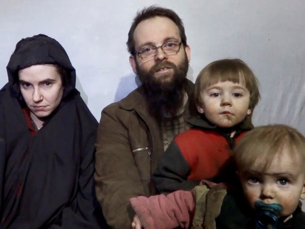 PHOTO: A still image from a video posted by the Taliban on social media, Dec. 19, 2016, shows American Caitlan Coleman next to her Canadian husband Joshua Boyle and their two sons.