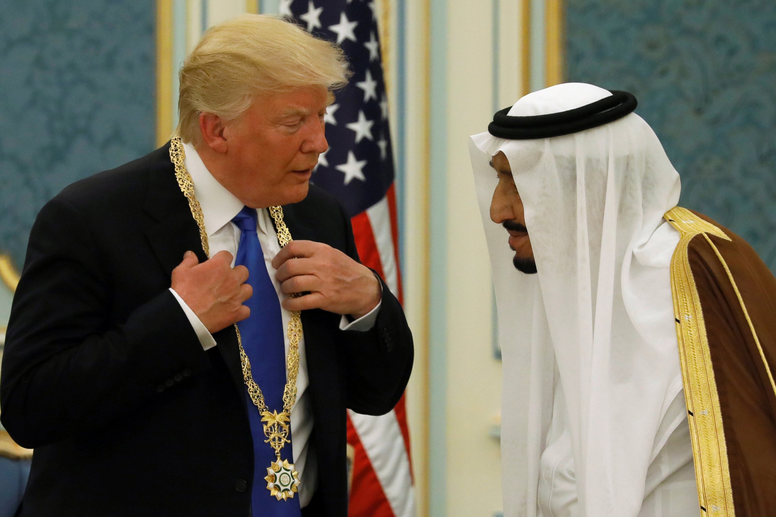 PHOTO: Saudi Arabia's King Salman bin Abdulaziz Al Saud (R) presents President Donald Trump with the Collar of Abdulaziz Al Saud Medal at the Royal Court in Riyadh, Saudi Arabia, May 20, 2017.