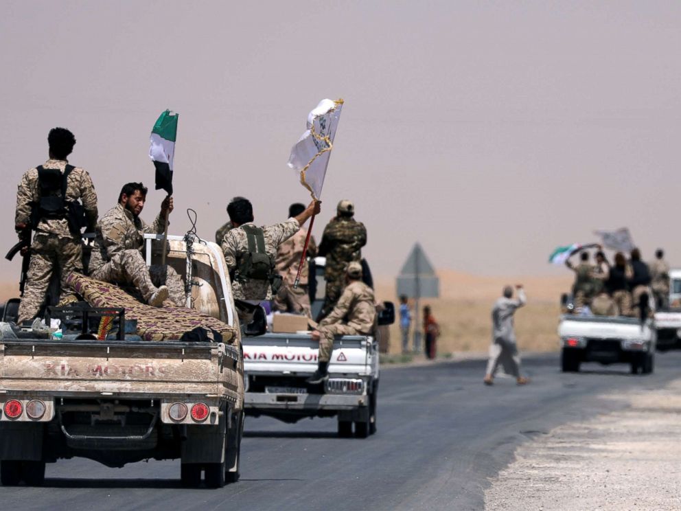 PHOTO: Syrian Democratic Forces (SDF) fighters on their way to Raqqa, Syria, June 6, 2017.