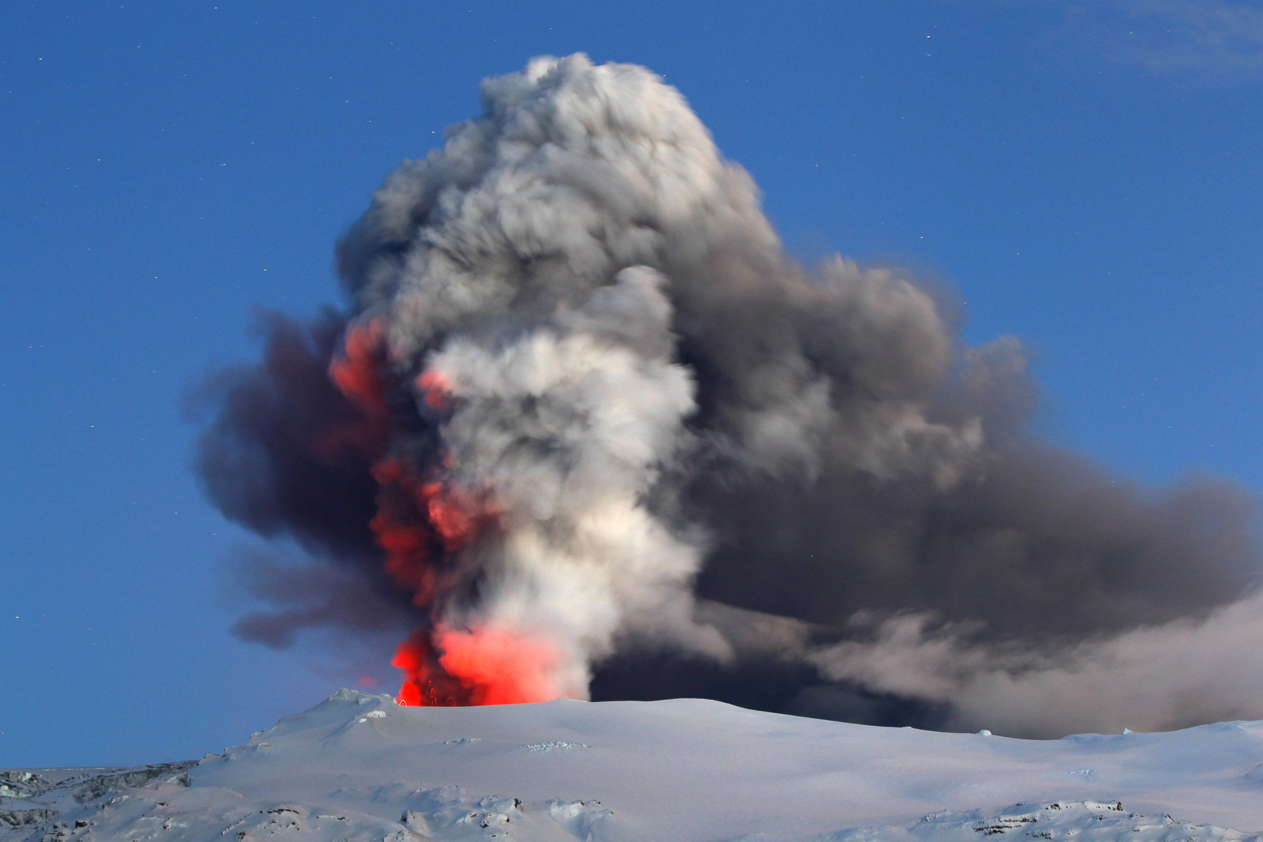 PHOTO: Lava and ash explode out of the caldera of Iceland's Eyjafjallajokull volcano in this file photo, April 22, 2010. 