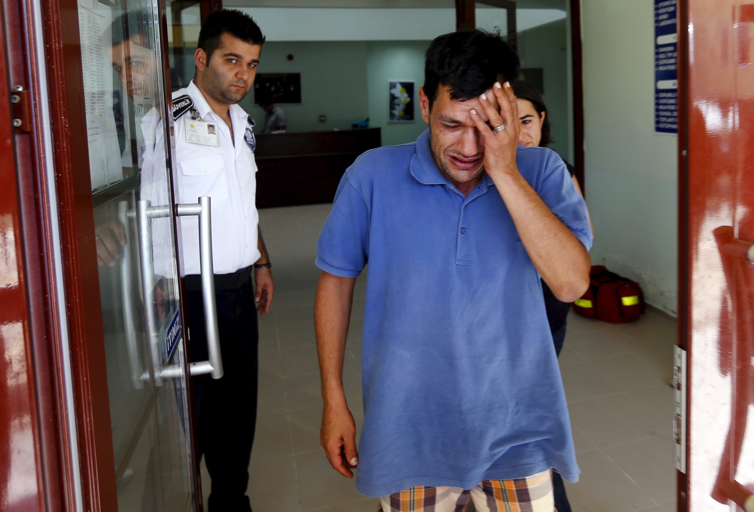 PHOTO: Abdullah Kurdi, father of three-year old Alan Kurdi, cries as he leaves a morgue in Mugla, Turkey, Sept. 3, 2015.