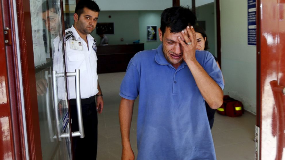 Abdullah Kurdi, father of three-year old Alan Kurdi, cries as he leaves a morgue in Mugla, Turkey, Sept. 3, 2015.