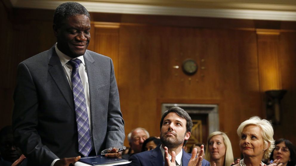 PHOTO: Actor, writer and director Ben Affleck (C) and Cindy McCain (L), applaud Denis Mukwege, (L), Medical Director of the Panzi Hospital in the Congo, at the Senate Foreign Relations Committee on Capitol Hill in Washington Feb. 26, 2014.