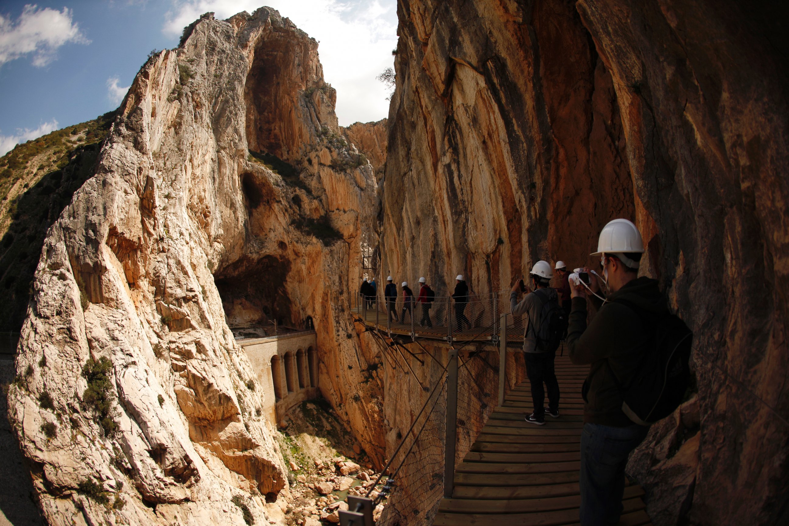 PHOTO: Journalists walk along the new Caminito del Rey (The King's Little Pathway) in El Chorro-Alora, near Malaga, southern Spain March 15, 2015.