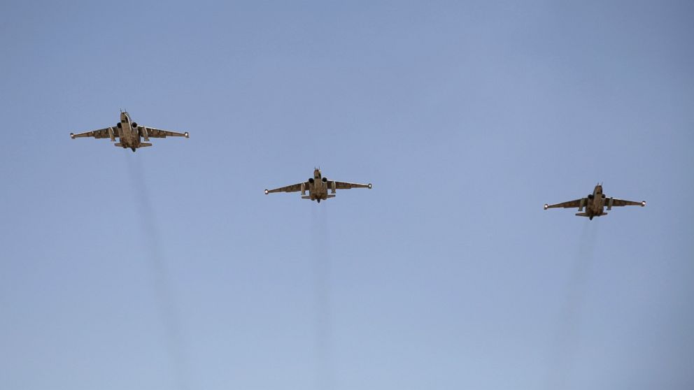 Two Ukrainian Sukhoi SU-25 fighter jets were shot down today, the Ukrainiain defense ministry says. In this file photo, Sukhoi SU-25 planes fly over a Bagdhad airport earlier this month.
