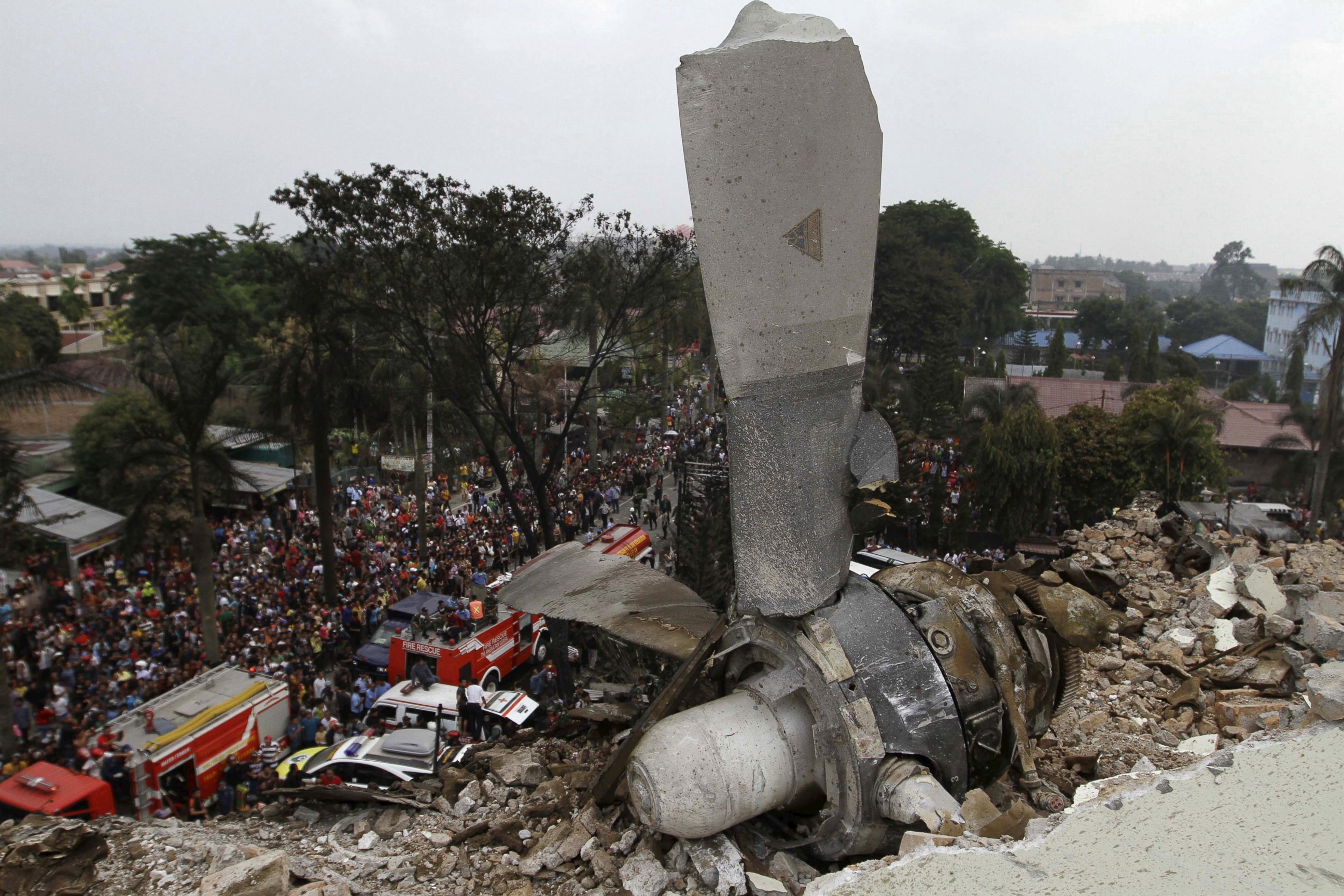 PHOTO: A propeller is seen from an air force cargo plane that crashed in Medan, North Sumatra, Indonesia, June 30, 2015.