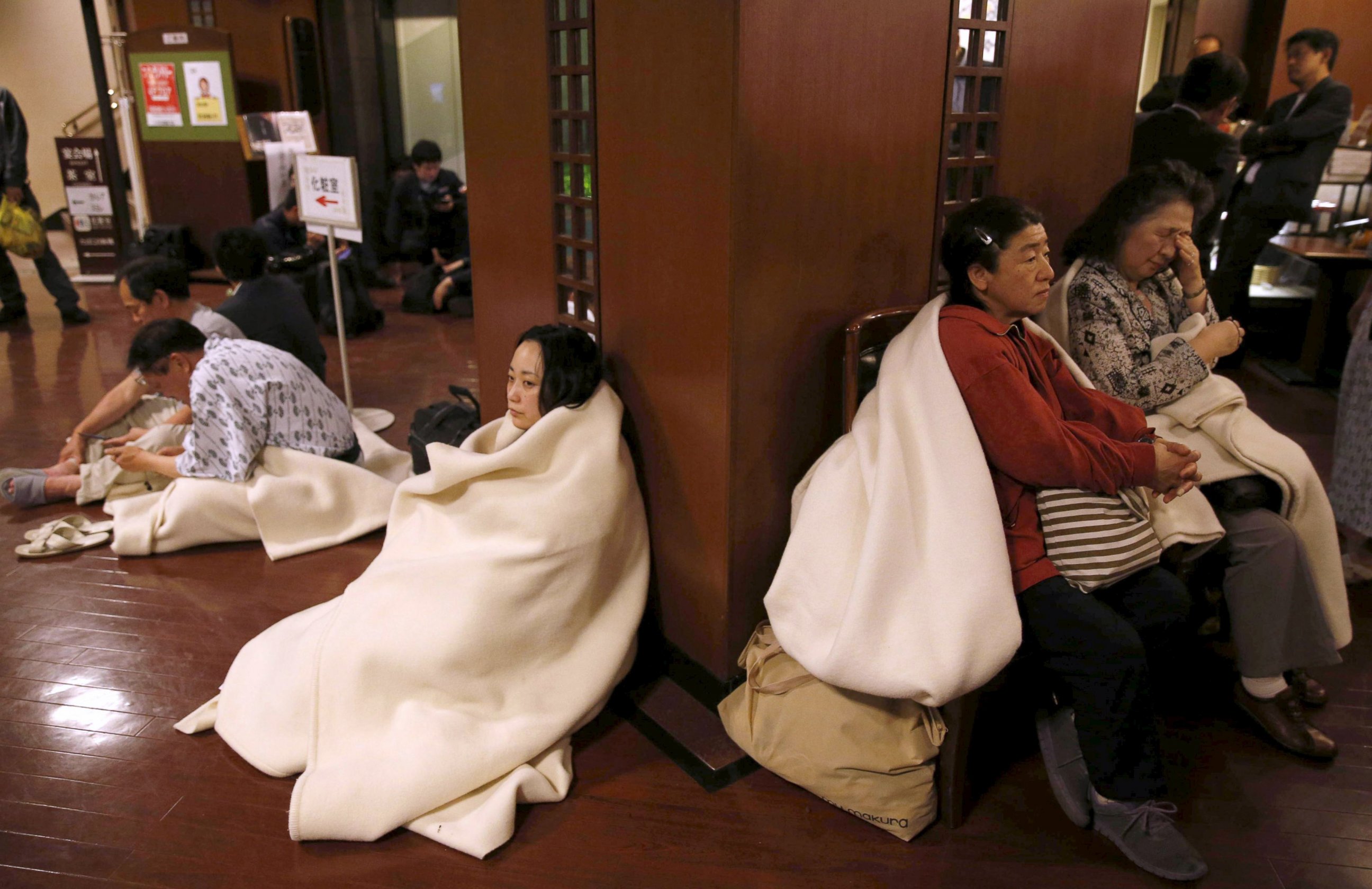 PHOTO: Hotel guests gather at the lobby after another earthquake hit the area in Kumamoto, southern Japan, in this photo taken by Kyodo, April 16, 2016.