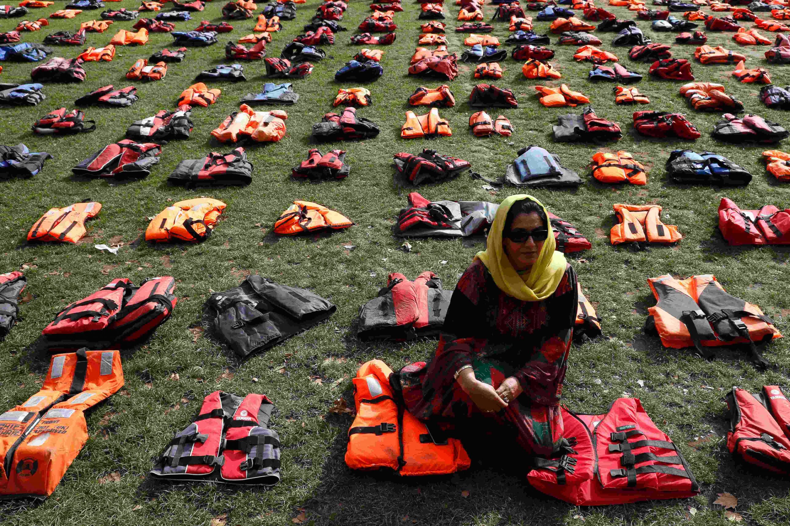 PHOTO: 2500 lifejackets worn by refugees during their crossing from Turkey to the Greek island of Chois are seen in Parliament Square in London, Sept. 19, 2016. 