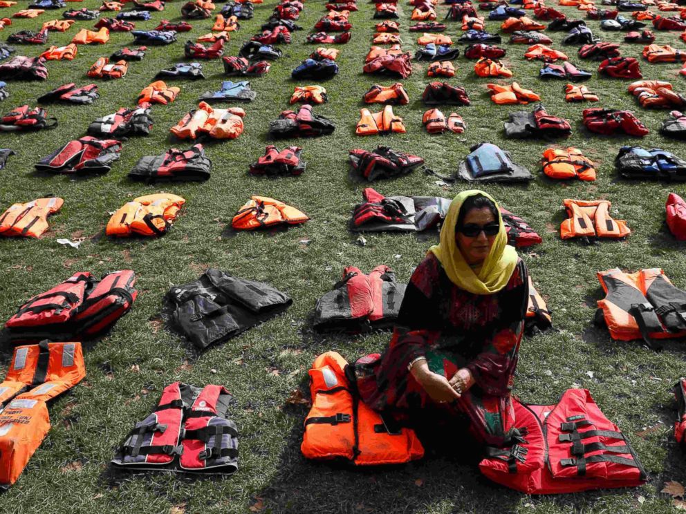 PHOTO: 2500 lifejackets worn by refugees during their crossing from Turkey to the Greek island of Chois are seen in Parliament Square in London, Sept. 19, 2016.