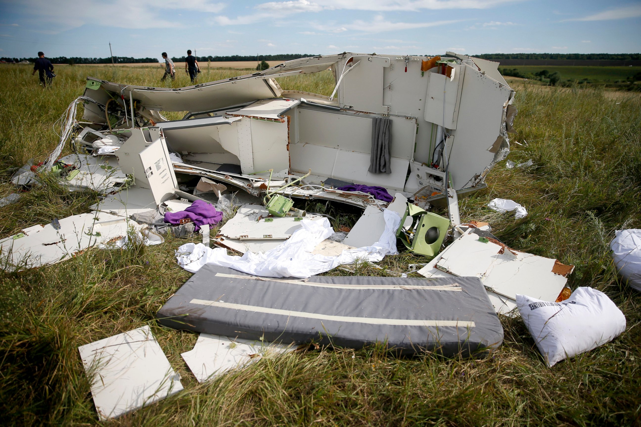 PHOTO: Parts of the wreckage are seen at a crash site of the Malaysia Airlines Flight MH17 near the village of Hrabove (Grabovo), Ukraine, July 21, 2014.