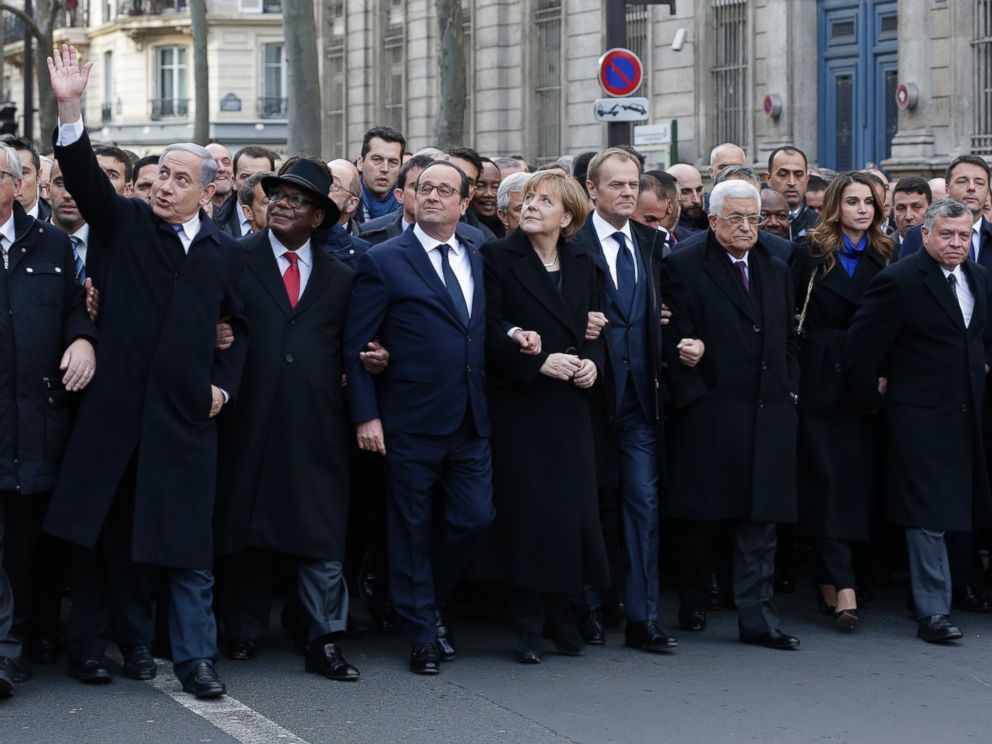 PHOTO: French President Francois Hollande is surrounded by head of states as they attend the solidarity march (Marche Republicaine) in the streets of Paris, Jan. 11, 2015.