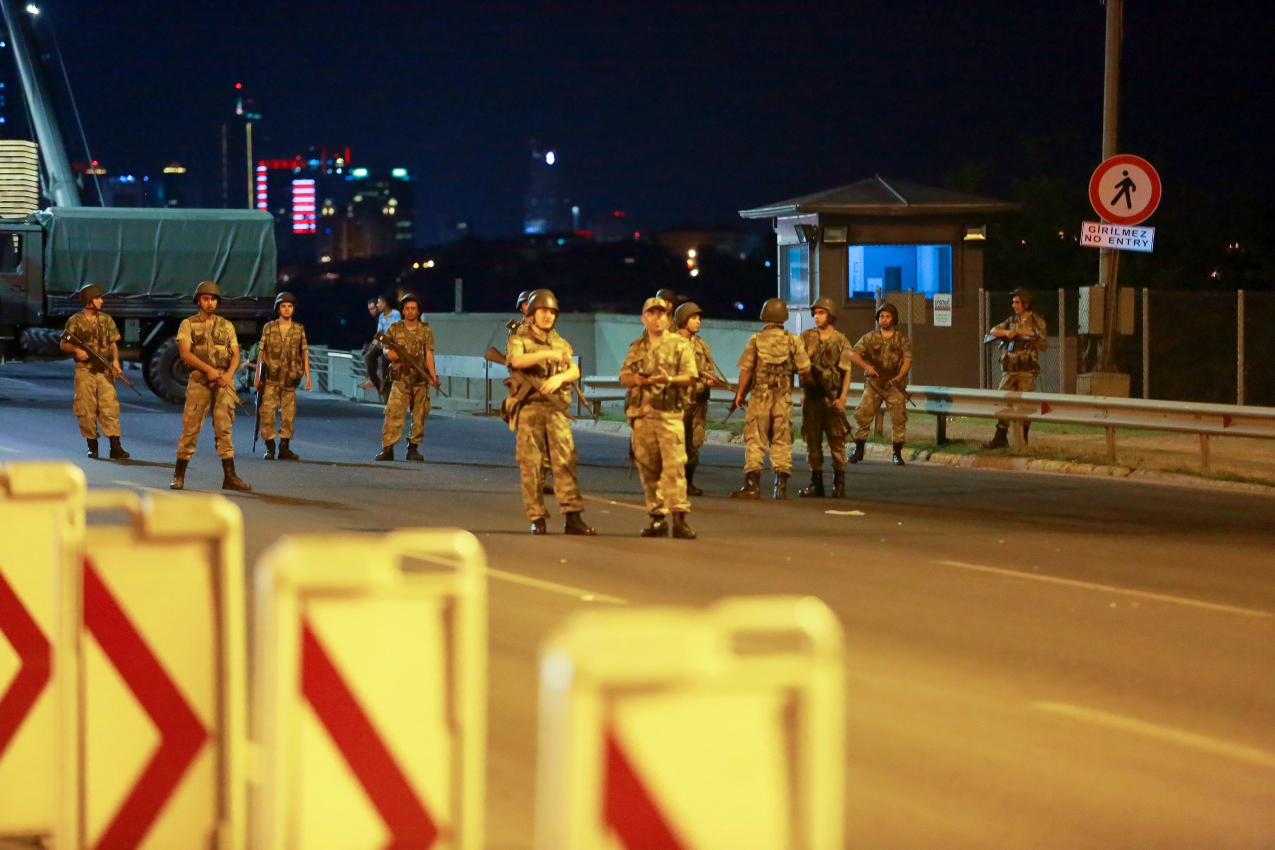 PHOTO: Turkish military block access to the Bosphorus bridge, which links the city's European and Asian sides, in Istanbul, Turkey, July 15, 2016.
