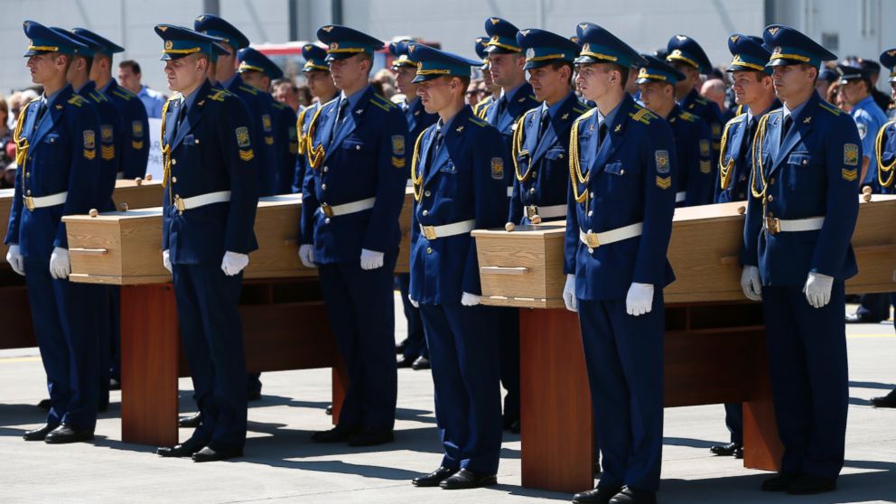Honor guard members participate in a memorial ceremony for the victims of Malaysia Airlines Flight MH17 at Ukraine’s Kharkiv airport, July 23, 2014.