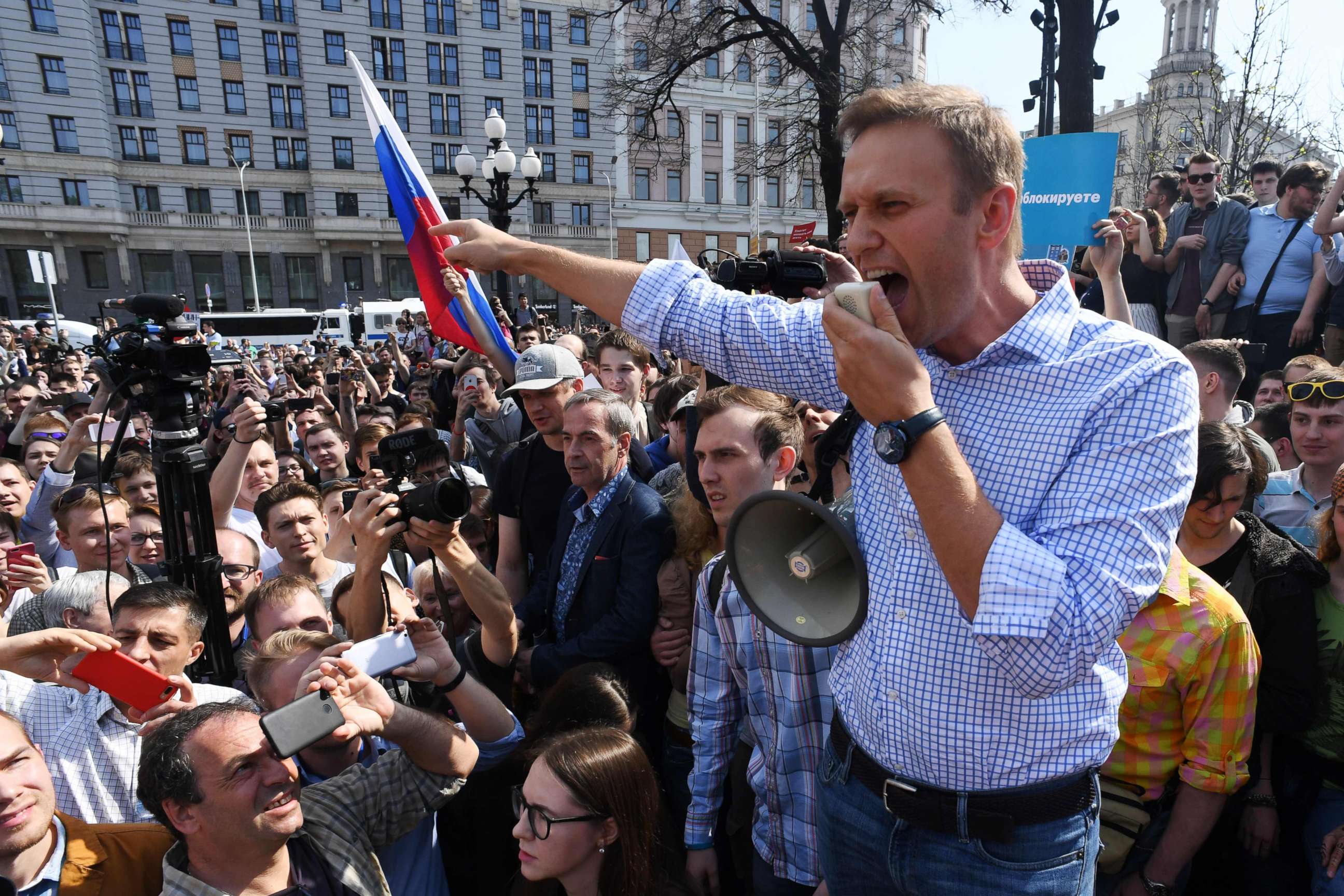 PHOTO: (FILES) In this file photo taken on May 05, 2018 Russian opposition leader Alexei Navalny addresses supporters during an unauthorized anti-Putin rally in Moscow, two days ahead of Vladimir Putin's inauguration for a fourth Kremlin term. 