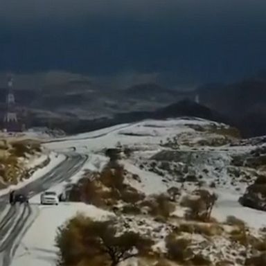 Stunning drone footage shows snow dusting the mountaintops around Tabab in Saudi Arabia.