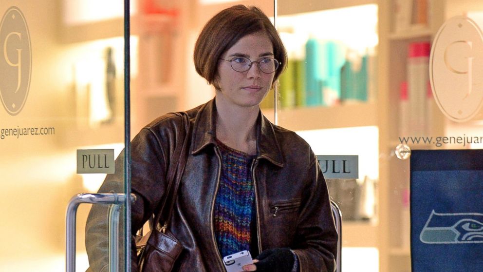 Amanda Knox steps out of a salon, Jan. 28, 2014, in Seattle.