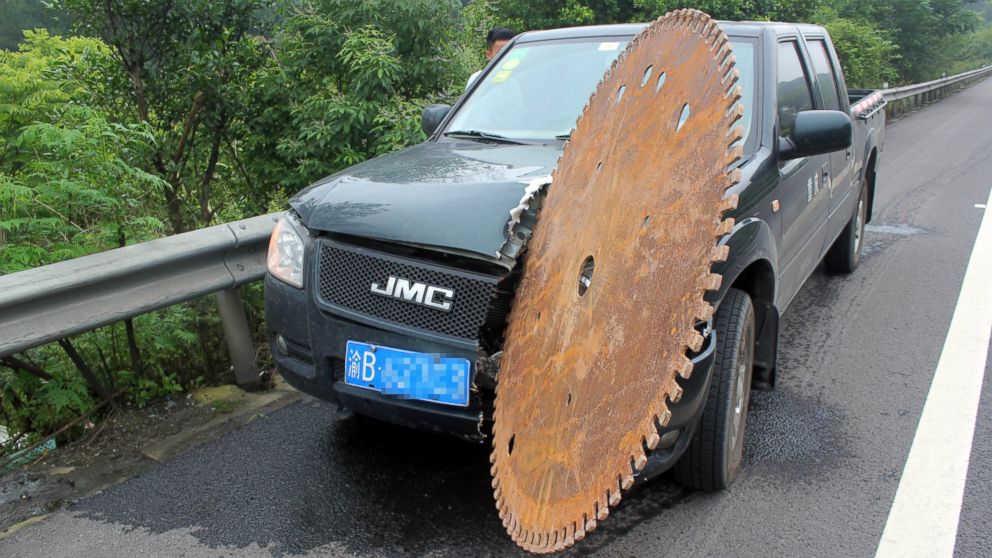 A view of the accident site after a massive circular saw blade smashed into the front of a pickup truck on the Chongqing-Guizhou Expressway in Chongqing, China,  June 17, 2015.
