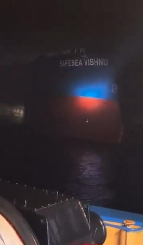 PHOTO: A screenshot from video circulating online shows the lettering of "Safesea Vishnu" visible on the ship's waterline as the vessel is doused with water on Thursday, March 12, 2026.