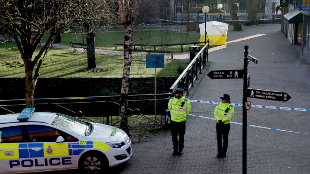 Police officers guard a cordon around a police tent covering the the spot where former Russian double agent Sergei Skripal and his daughter were found critically ill following exposure to an "unknown substance" in Salisbury, England, March 7, 2018. 