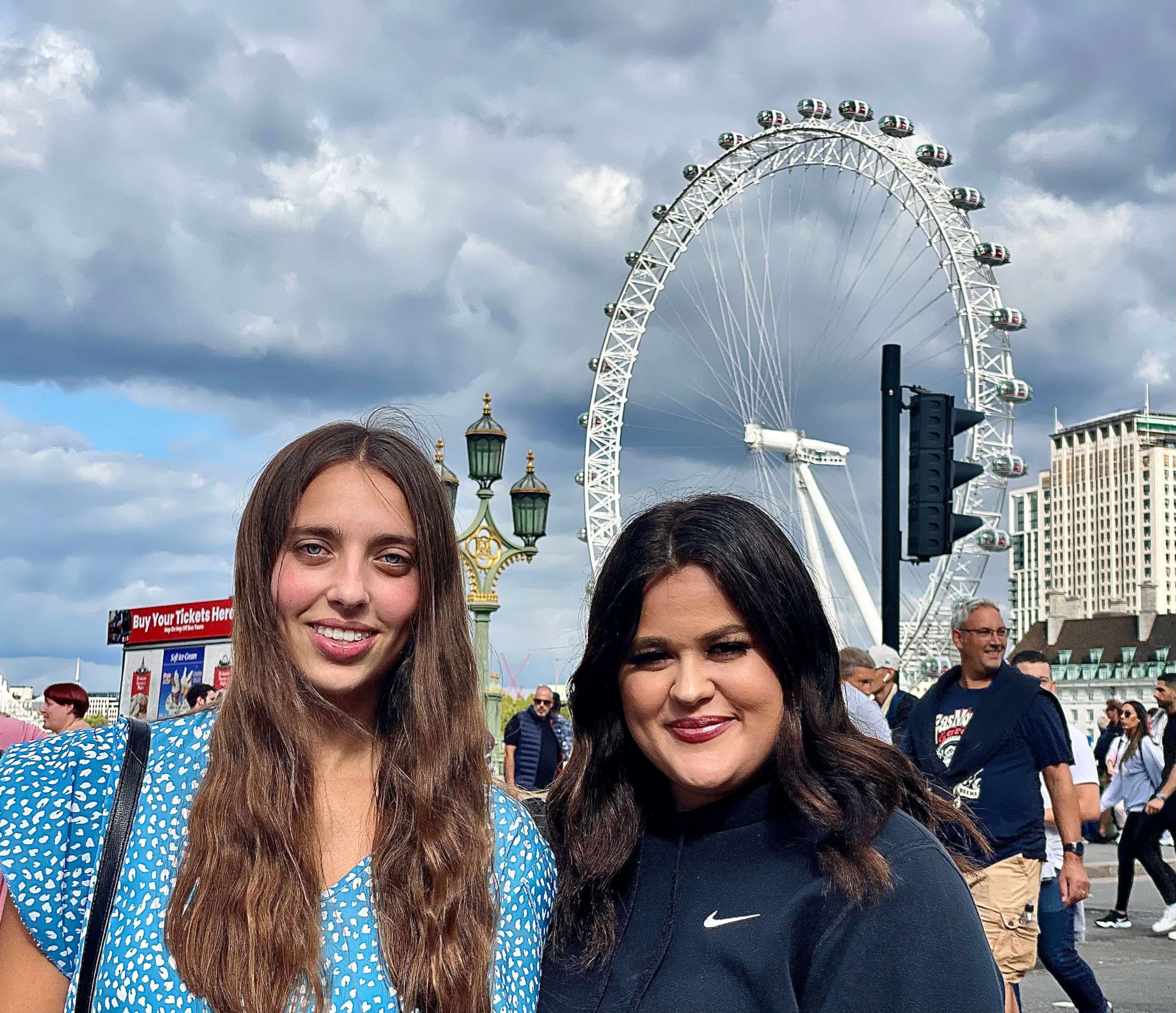 PHOTO: Maria Slatter and Imy Stratton are among the hundreds of thousands of mourners lining up to pay their respects in London as Queen Elizabeth II lies in state in Westminster Hall until her state funeral on Monday, Sept. 19, 2022.