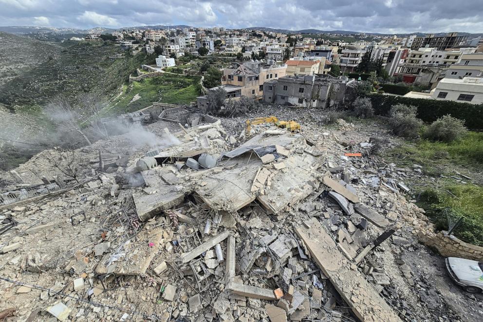 PHOTO: First responders clear the rubble from the site of an Israeli airstrike that targeted a building in the southern Lebanese village of Hanouiyeh, east of Tyre, on March 30, 2026.