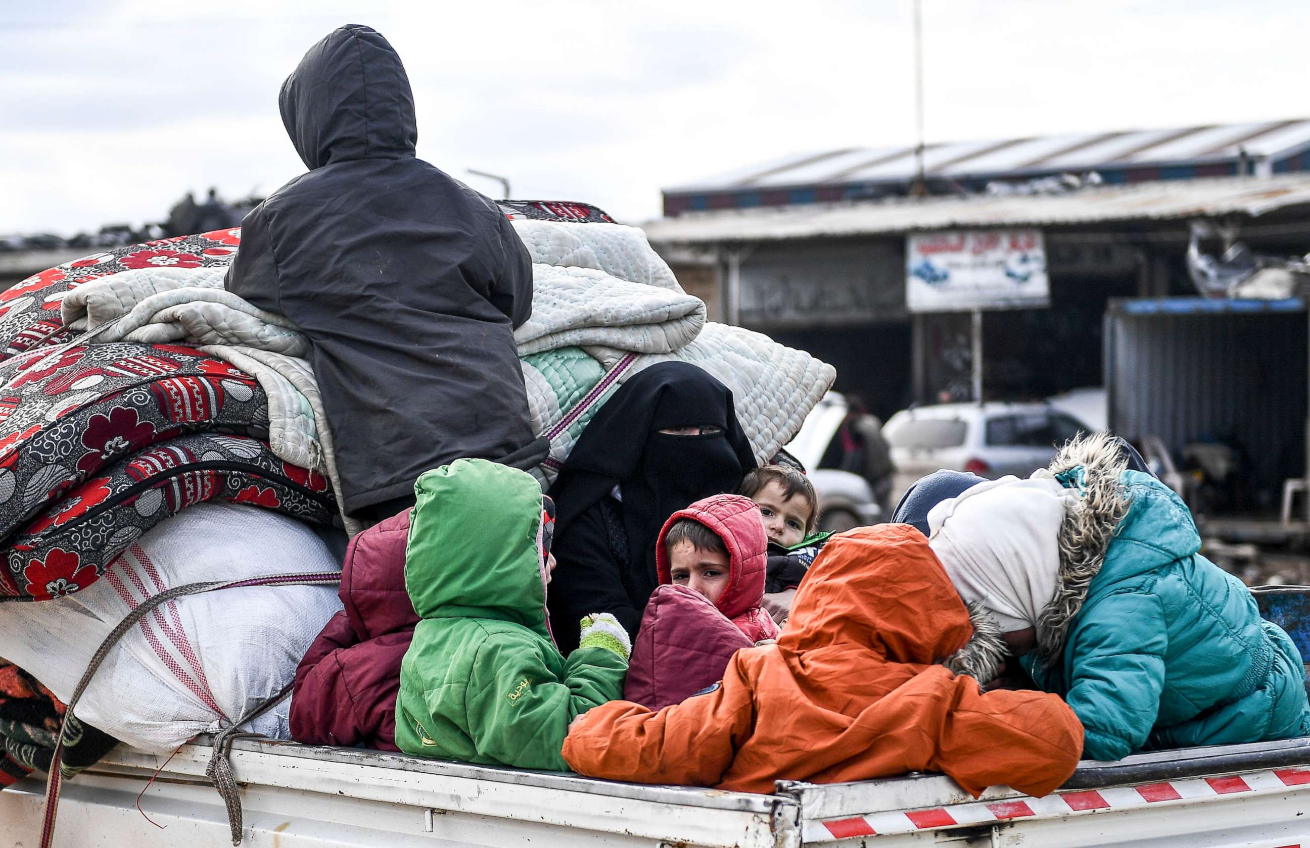 PHOTO: Civilians flee from Idlib toward the north to find safety inside Syria near the border with Turkey, Feb. 15, 2020.