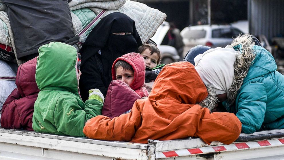 PHOTO: Civilians flee from Idlib toward the north to find safety inside Syria near the border with Turkey, Feb. 15, 2020.