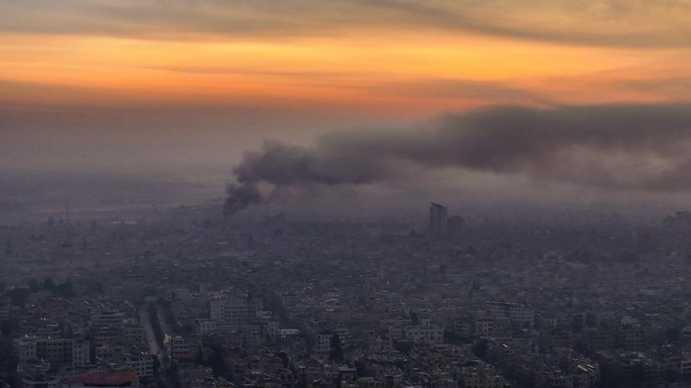 PHOTO: An aerial picture shows smoke billowing following airstrikes in Damascus early on Dec. 10, 2024.