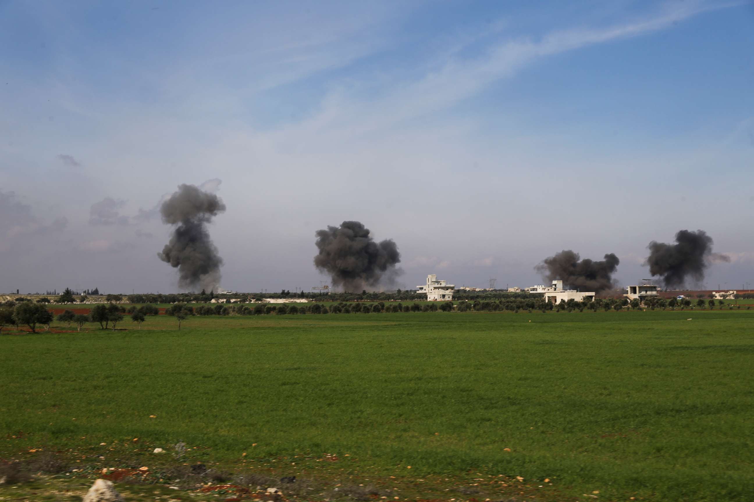 PHOTO: Columns of smoke raise after airstrikes hit town of Saraqeb, in Idlib province, Syria, Thursday, Feb. 27, 2020. Turkey-backed Syrian opposition fighters Thursday retook a strategic northwestern town iof Saraqeb, opposition activists said.