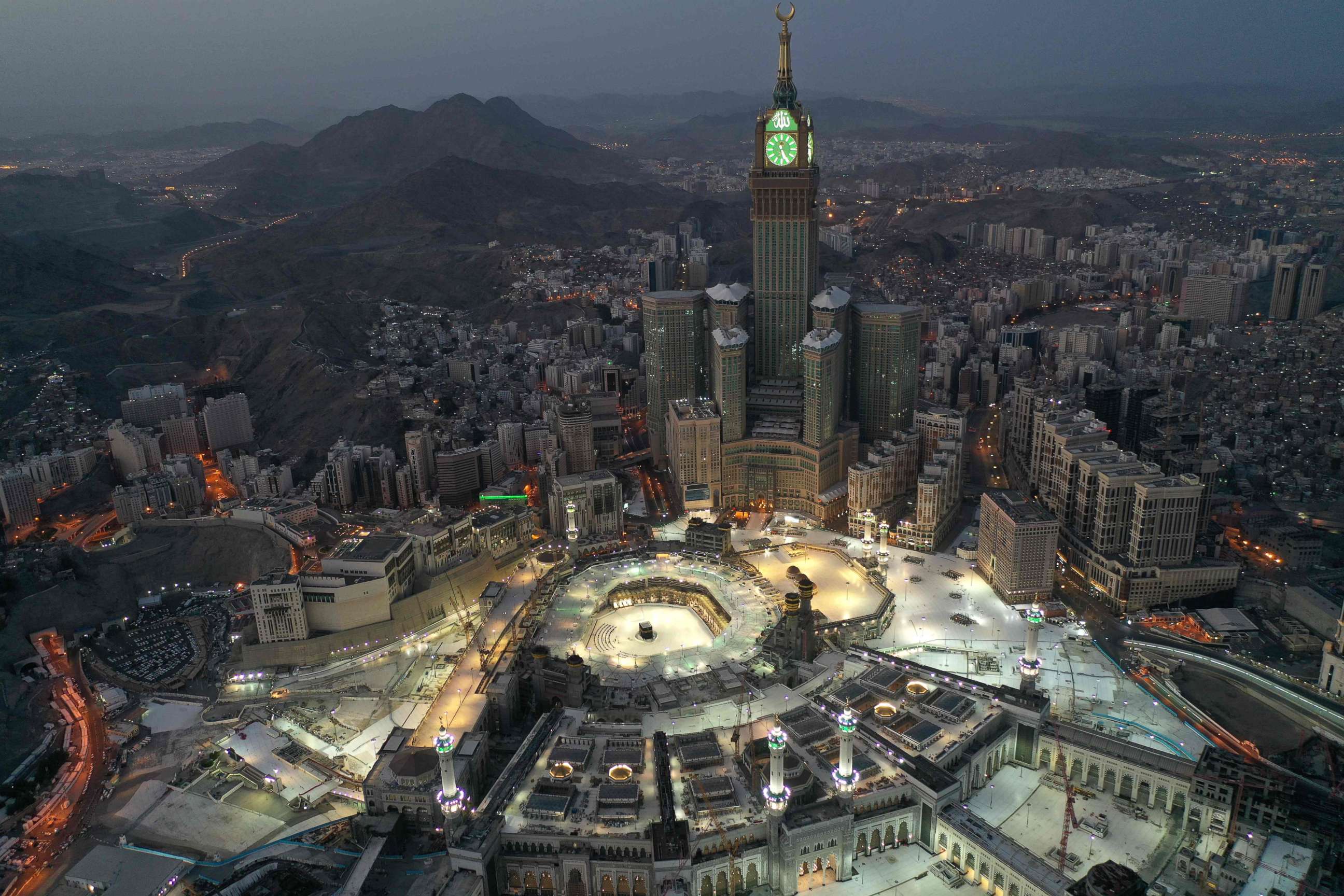 An aerial view of Saudi Arabia's holy city of Mecca, with the Abraj al-Bait Mecca Royal Clock Tower overlooking the Grand Mosque and Kaaba in the center, May 24, 2020.