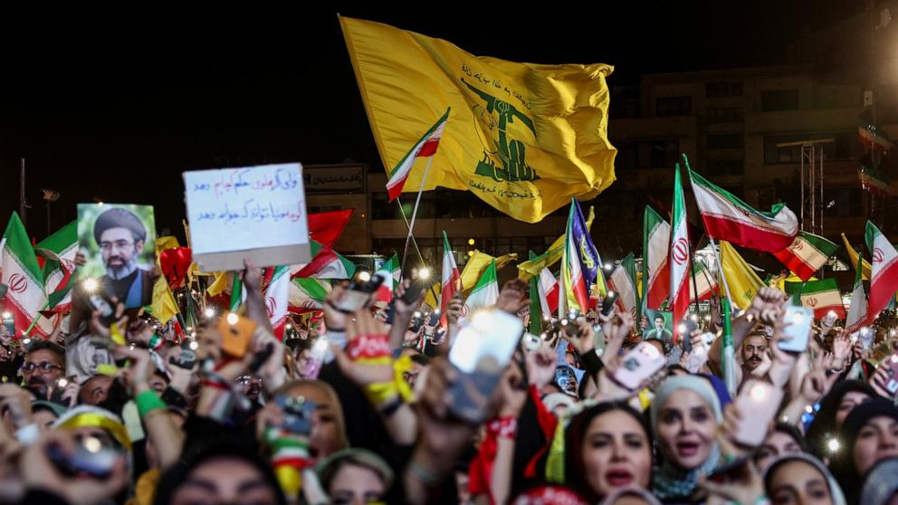 PHOTO: A Hezbollah flag is seen during an anti-U.S. and anti-Israel rally after Iran's missile attack on Israel, in Tehran, Iran, on June 7, 2026.