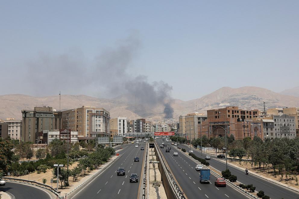 PHOTO: Smoke rises following what Iran says was an Israeli attack on Sharan Oil depot in Tehran, Iran, on June 16, 2025.