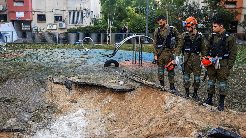 PHOTO: Israeli emergency services work at the scene of a missile strike that Israel's military said was launched from Yemen, south of Tel Aviv, Israel, on Dec. 21, 2024. 