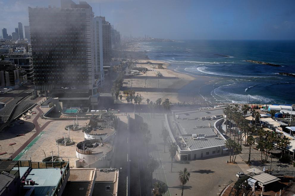 PHOTO: Smoke rises after debris from an incoming projectile that was intercepted fell on Tel Aviv's seaside promenade, on March 31, 2026.
