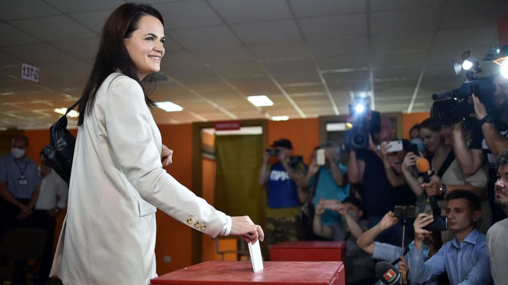 PHOTO: Presidential candidate Svetlana Tikhanovskaya casts her ballot at a polling station during the presidential election in Minsk on August 9, 2020. 